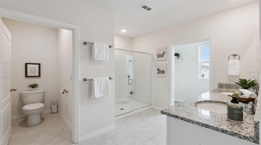 Owners bath with private water closet