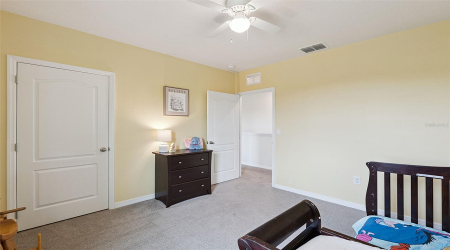 Bedroom complete with ceiling fan