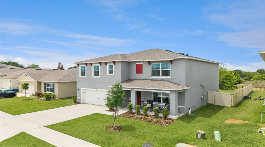 A nice size front porch and fresh landscape invite you into this home