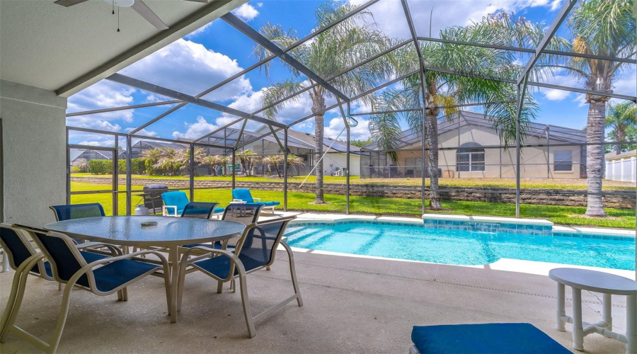 Covered patio overlooking pool