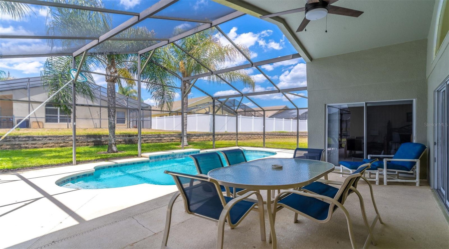 Covered patio overlooking pool