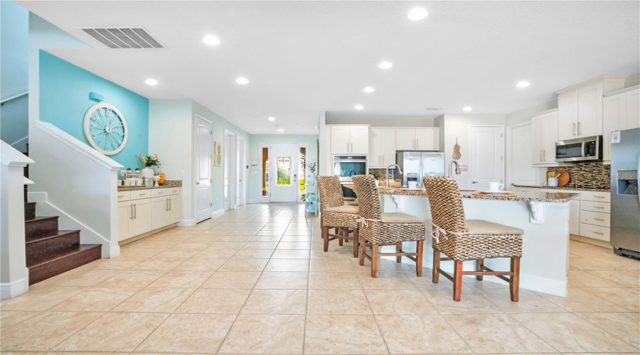 Bright and welcoming interior with expansive living spaces and coastal-inspired finishes