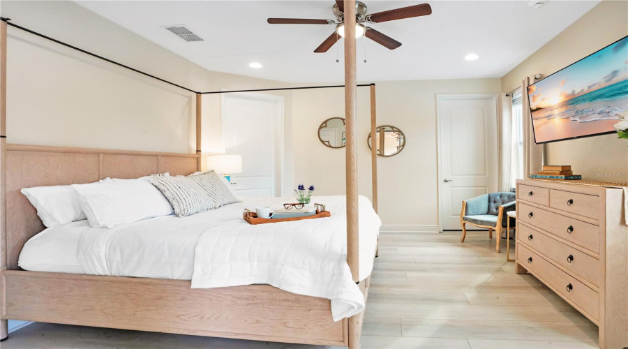 Primary suite with large walk in closet and his and hers closets