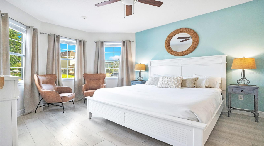 Beautifully appointed downstairs bedroom (2) with calming coastal-inspired décor