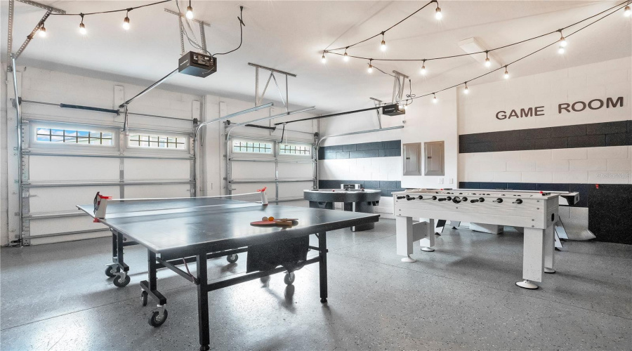 Large game room with multiple entertainment zones designed for unforgettable guest experiences