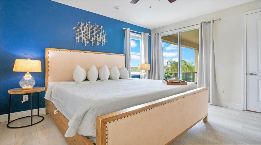 Spacious secondary primary retreat featuring abundant natural light and private balcony access