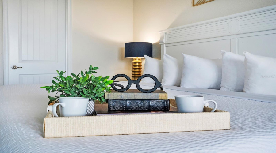 Thoughtfully curated bedroom details with timeless coastal-inspired styling