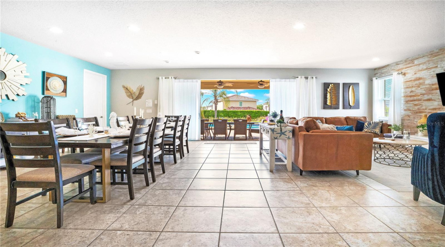 Oversized open-concept gathering space ideal for hosting large groups, celebrations, and for  entertaining