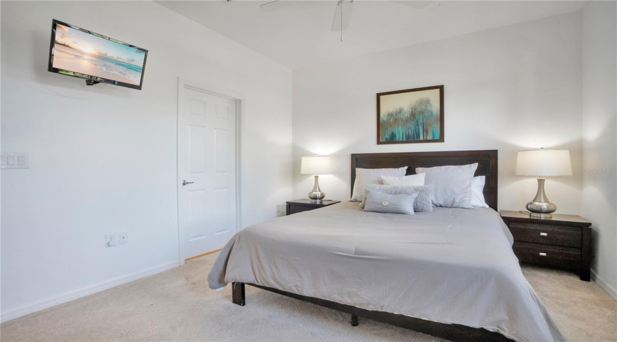Bedroom with ample space and neutral tones.