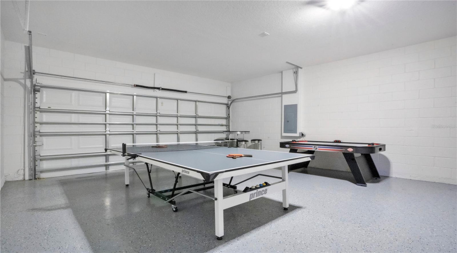 Game room space ideal for entertainment and rental appeal.
