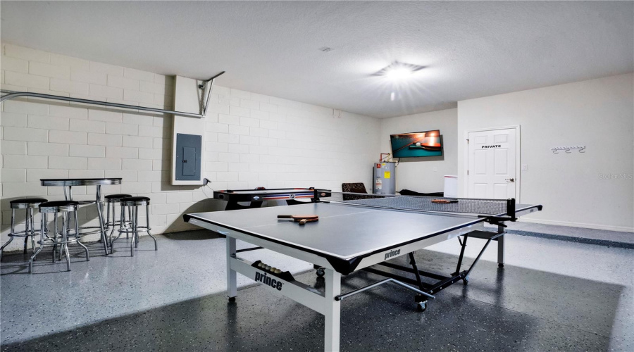 Fully equipped game room adding value for short term rental.