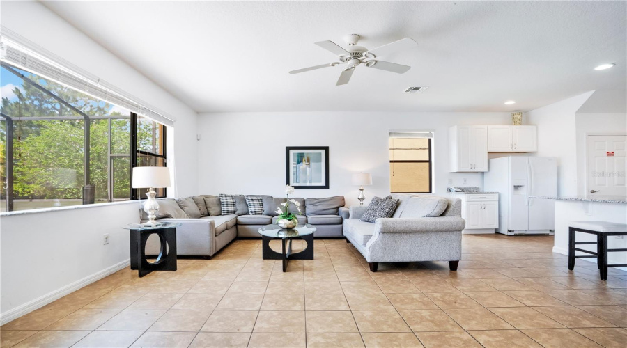 Open concept layout connecting kitchen and family room.
