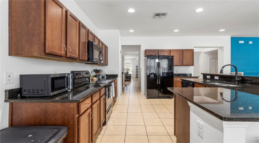 DAVENPORT, Florida 33837, 6 Bedrooms Bedrooms, ,5 BathroomsBathrooms,Residential,For Sale,ORANGE COSMOS,0,MFRTB8507217
