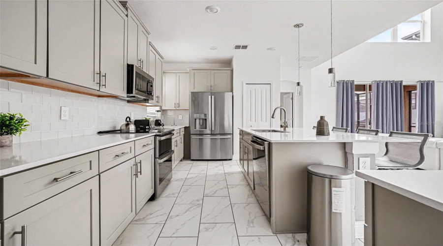 KISSIMMEE, Florida 34746, 5 Bedrooms Bedrooms, ,5 BathroomsBathrooms,Residential,For Sale,RHYME,0,MFRTB8505515