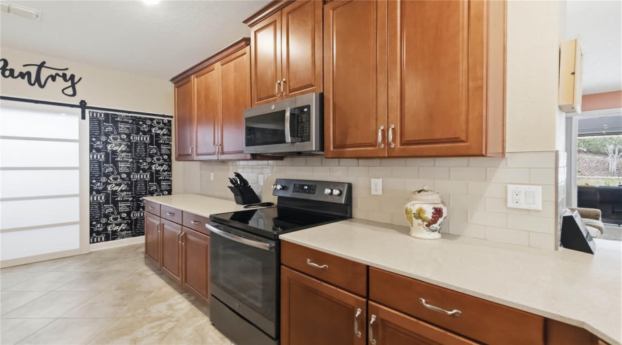 maple cabinetry, quartz countertops