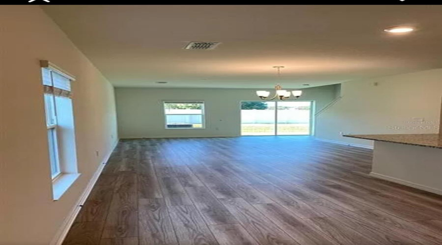 “Open living space ideal for everyday living and entertaining.”