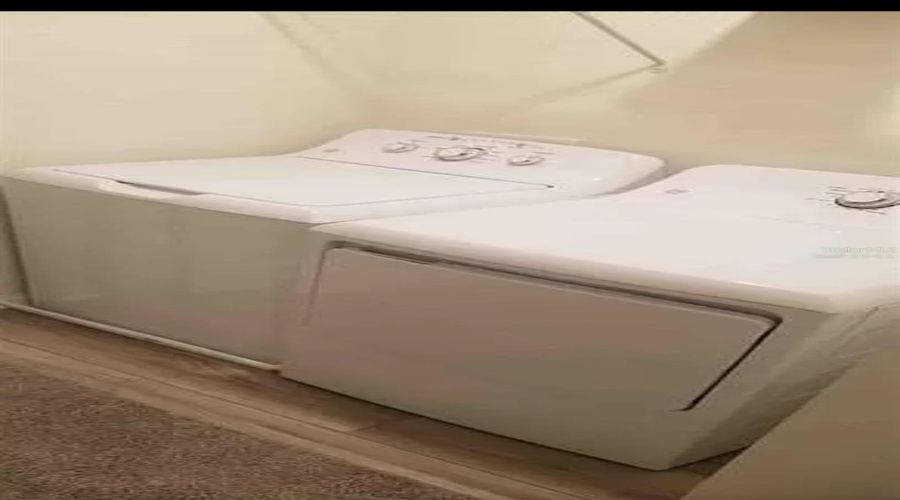 “Laundry area with washer and dryer hookups.”