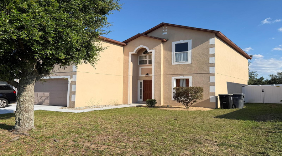 Large front yard and driveway