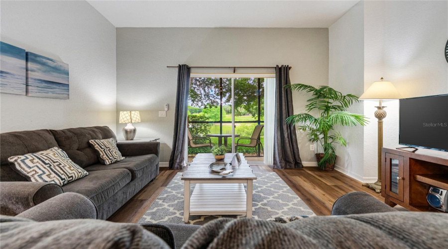 Spacious living room with functional and beautiful LVP flooring