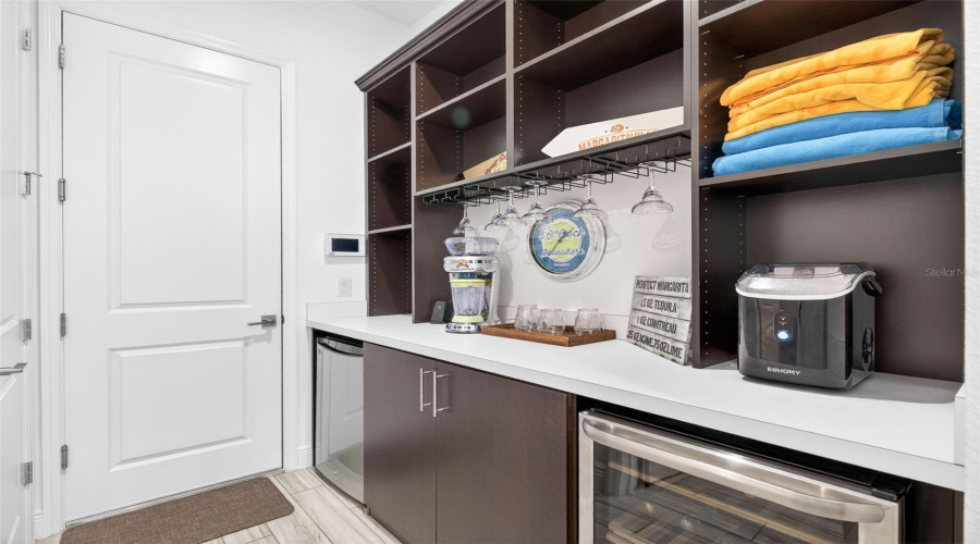 Butler's pantry between garage and kitchen