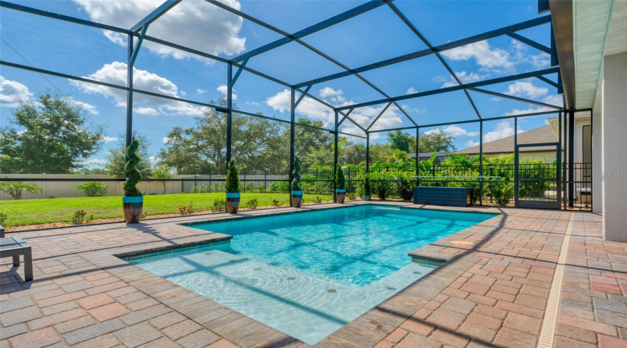 screen-enclosed heated salt water pool