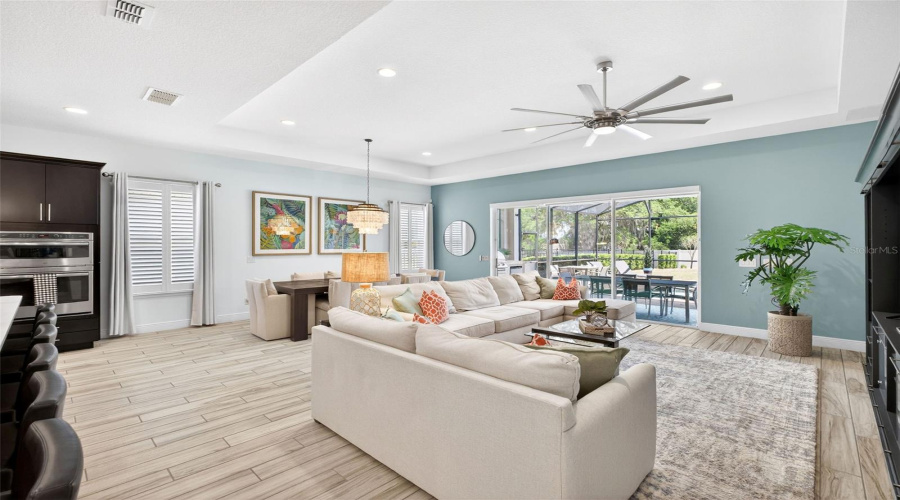 Light and bright open floor plan living, dining, and kitchen
