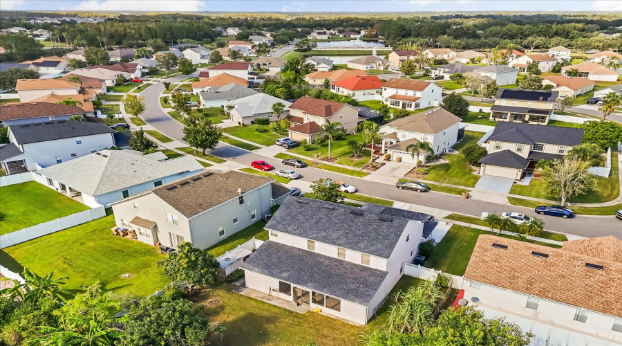 Side-back aeriel view of house