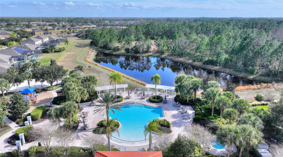 Clubhouse with pool and water view