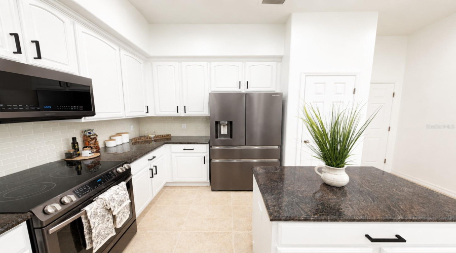 ORLANDO, Florida 32836, 3 Bedrooms Bedrooms, ,2 BathroomsBathrooms,Residential,For Sale,THE ESPLANADE,0,MFRO6410736