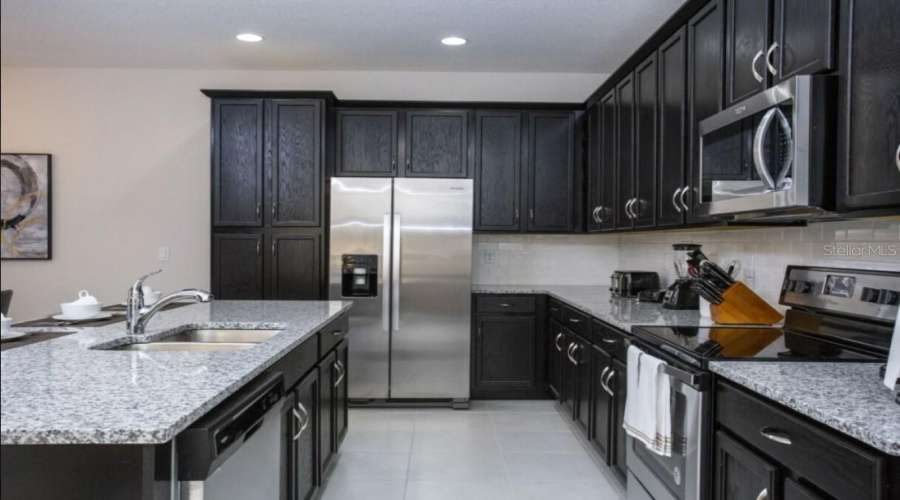 KISSIMMEE, Florida 34747, 5 Bedrooms Bedrooms, ,4 BathroomsBathrooms,Residential,For Sale,CAREY PALM,0,MFRO6411209