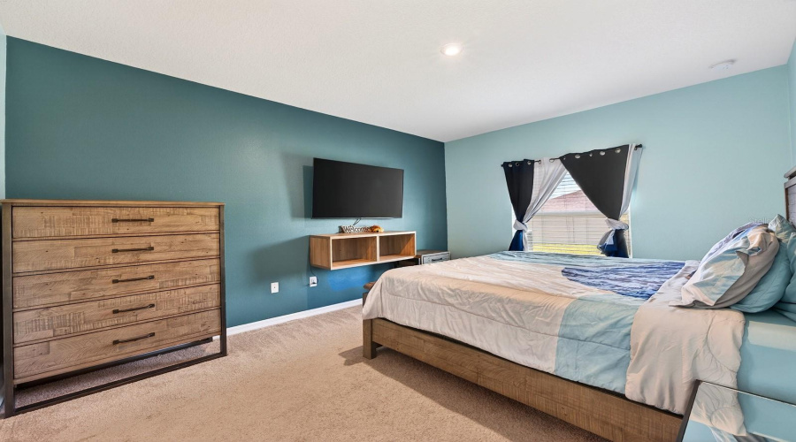 A desirable SPLIT-BEDROOM FLOOR PLAN provides added privacy, with the Primary Suite tucked away at one end of the home.