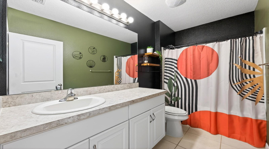 A full guest Bathroom is near the secondary Bedrooms.