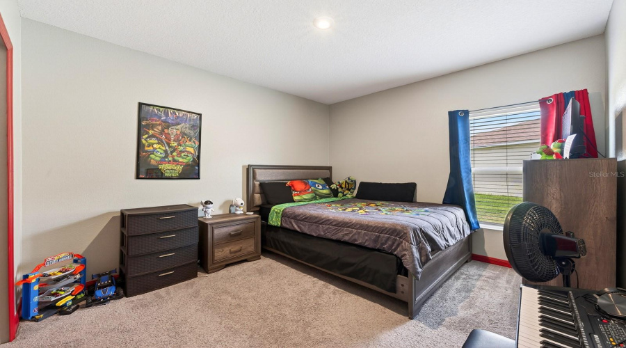 Two additional bedrooms and SECOND FULL BATH are located on the opposite side of the home, offering flexibility for guests, family, or a home office. Bedroom 3