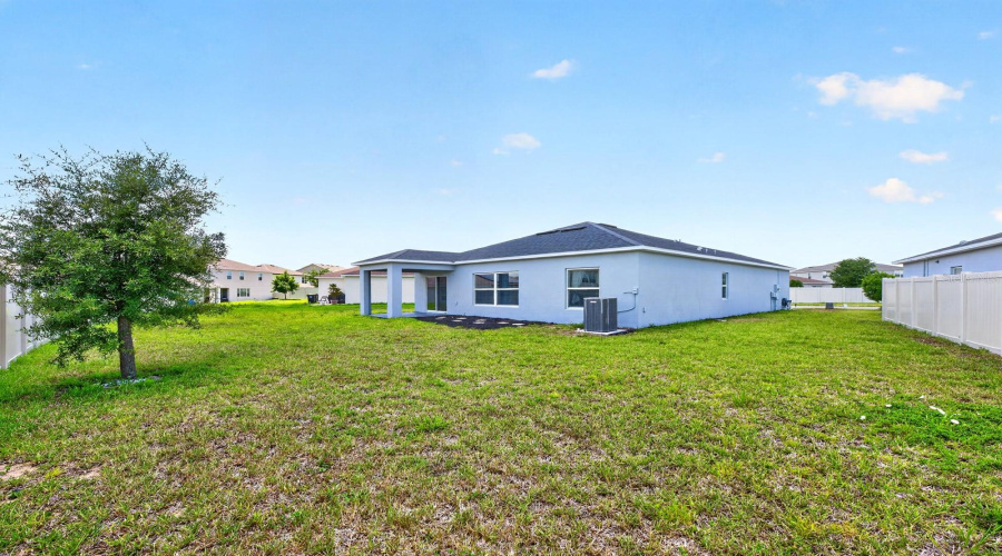 The generous outdoor space is perfect for gatherings and weekend barbecues.