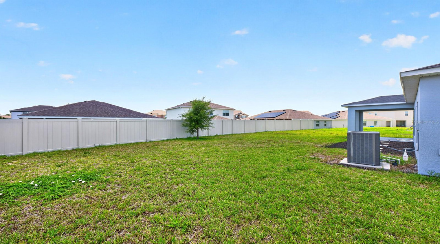 The generous outdoor space is perfect for gatherings and weekend barbecues.