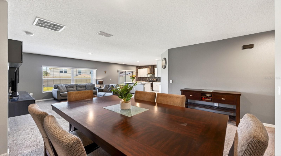 Step inside to discover a bright and inviting layout where the Living Room and Dining Room offer an OPEN, AIRY FEEL, creating the perfect space for entertaining or everyday living.