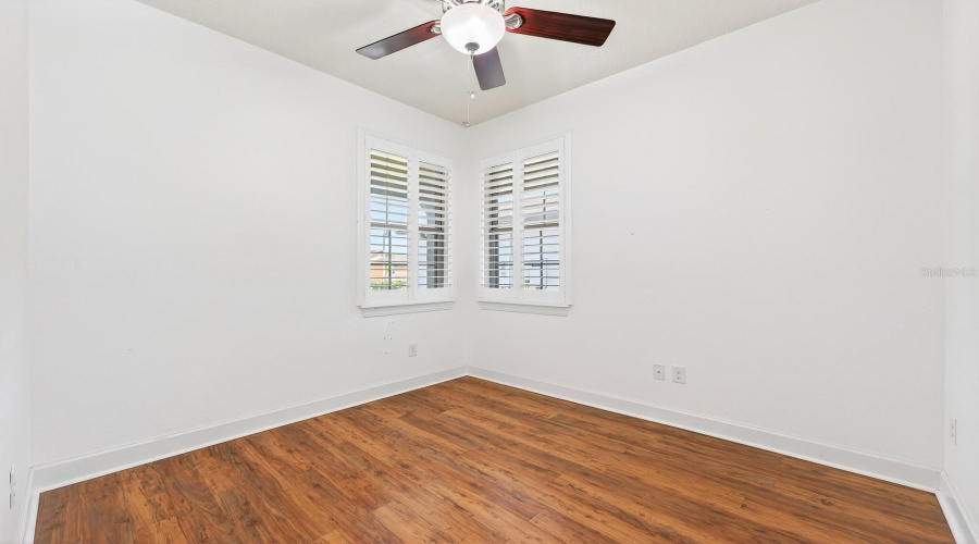 Two additional bedrooms and another full bath provide flexibility for guests, hobbies, or a home office. Bedroom 2