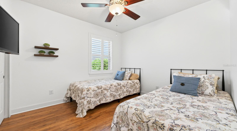 Two additional bedrooms and another full bath provide flexibility for guests, hobbies, or a home office. Bedroom 3
