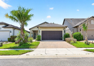 Welcome to this BEAUTIFULLY MAINTAINED home in the highly sought-after Del Webb Orlando community in Davenport, where RESORT-STYLE LIVING, elegant finishes, and active adult amenities come together in one exceptional package.