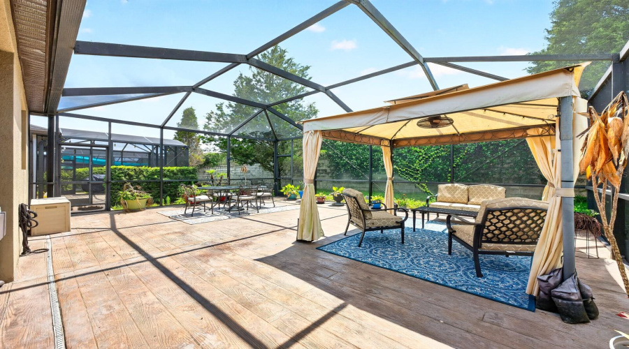 The OUTDOOR PATIO FURNITURE AND GRILL are included, making it truly MOVE-IN READY for enjoying the Florida lifestyle.