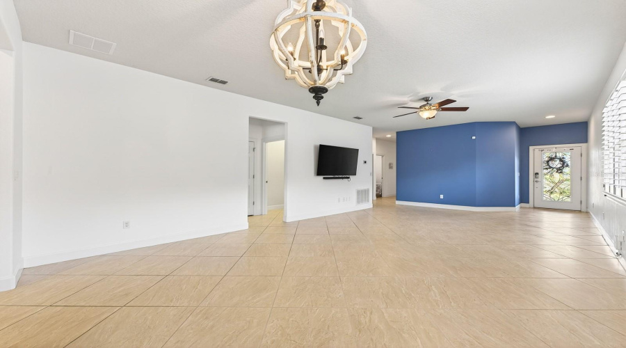 The Living Room and Dining area offer an OPEN, AIRY FEEL, making the home perfect for both entertaining and everyday relaxation.