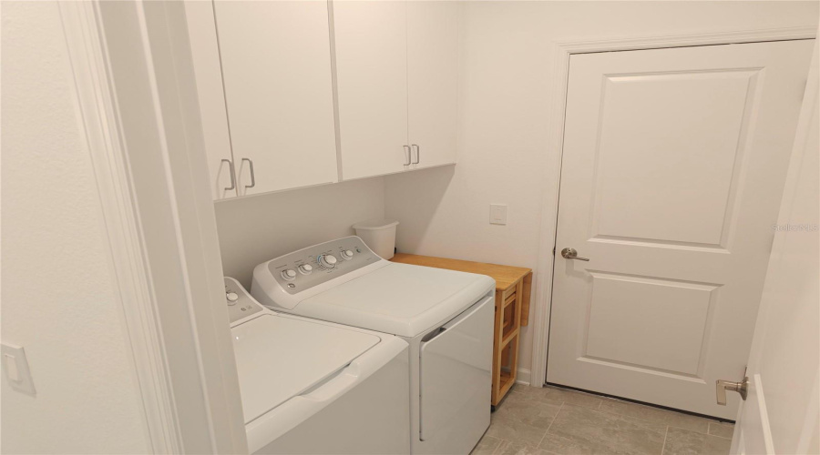 washer and dryer included with cabinets