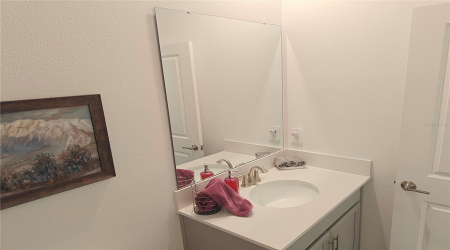 Quartz counter in hall 3rd full bathroom