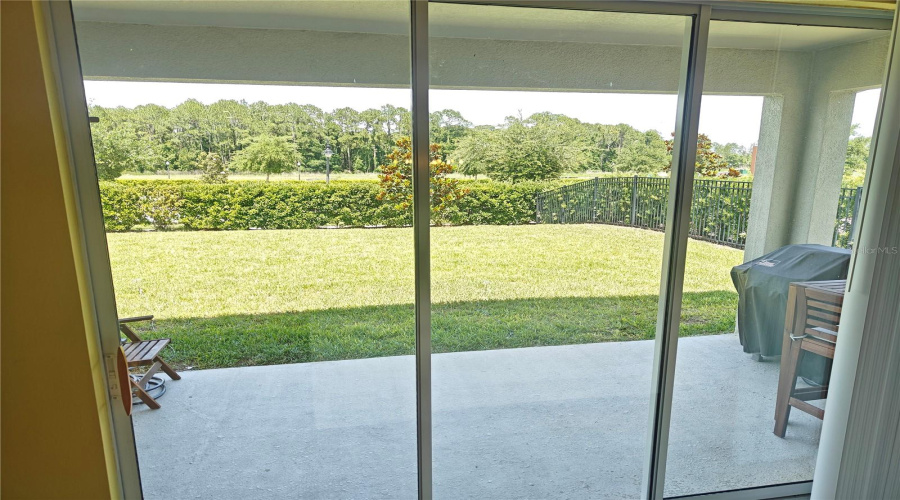 triple sliding glass drs to the patio off living room