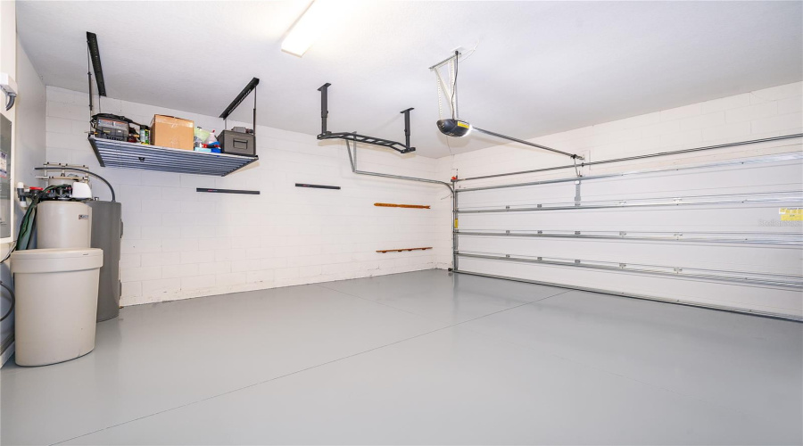 Upgraded garage, premium flooring with 7 -year warranty & Level 2 EV charging station