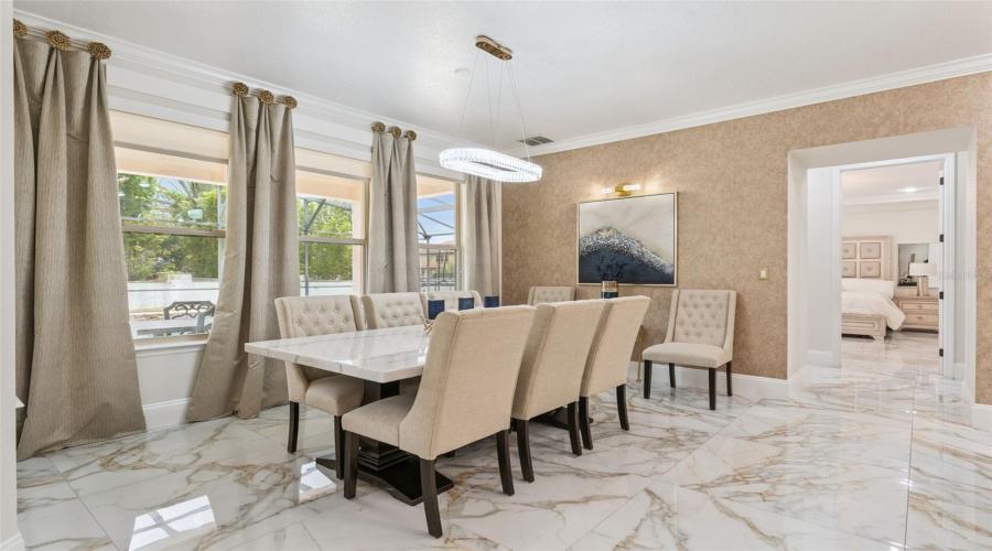 Sunny and spacious breakfast area providing the perfect setting for casual meals while overlooking the heart of the home