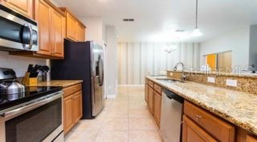 KISSIMMEE, Florida 34747, 4 Bedrooms Bedrooms, ,3 BathroomsBathrooms,Residential,For Sale,BANANA PALM,0,MFRG5112991