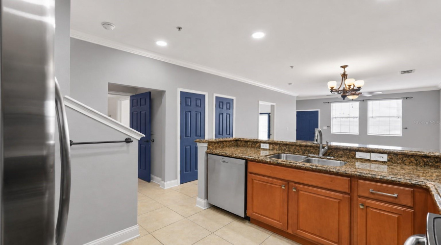 Kitchen with all stainless steel appliances.