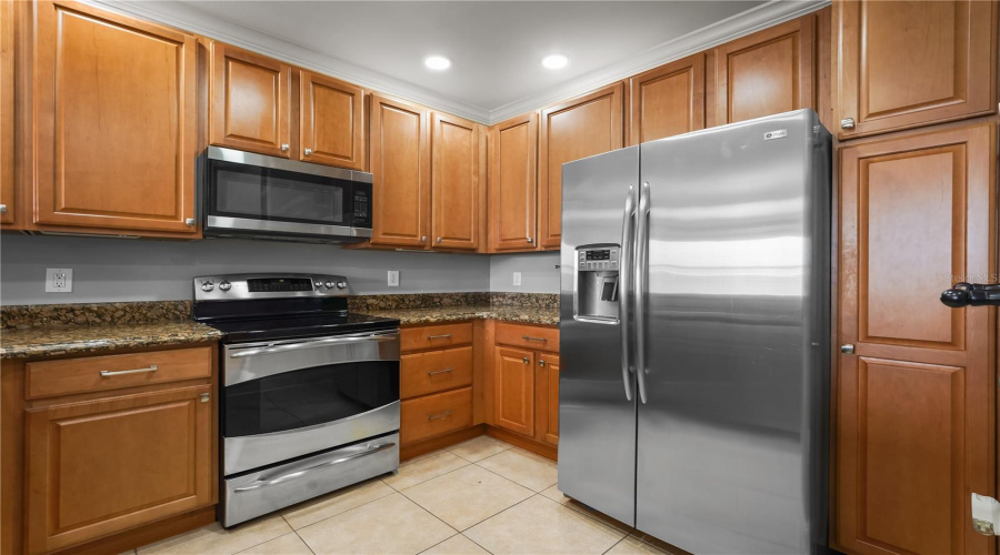 Kitchen with all stainless steel appliances.