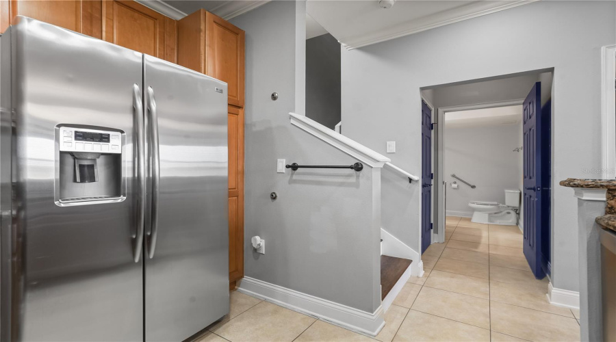 Kitchen with all stainless steel appliances.